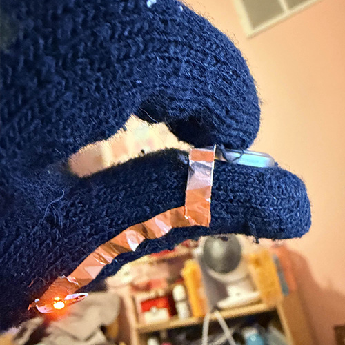 I wanted the switch to be where my finger and thumb would come in contact as an easy way to hold the battery in place.