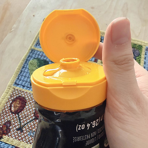 This interaction flicks the honey bottle open to be used.