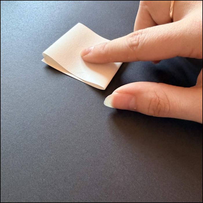 Here was a prototype of the switch, folding a piece of paper in a way two parts of it could be pressed together.