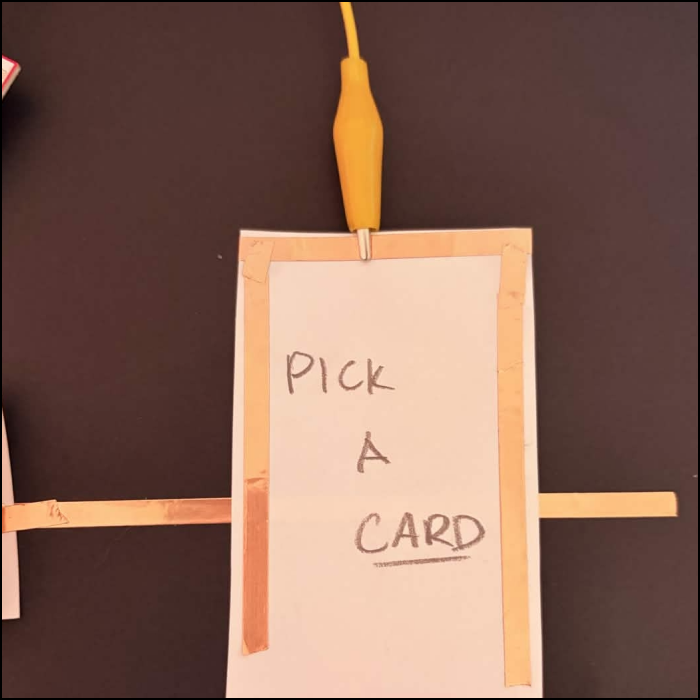 Heres the card facing up, the outline of copper tape will flip to make contact with the ground
